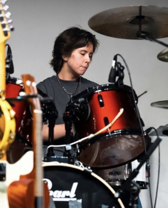 Studio Coordinator, Substitute Teacher Cameron Mertes