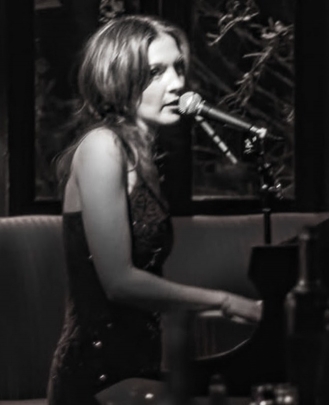 Vocals Teacher, Keyboard + Piano Teacher Izzy Rom