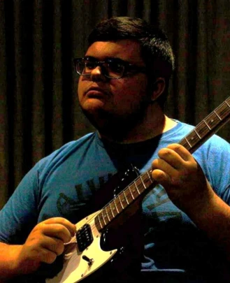 Guitar Teacher Logan