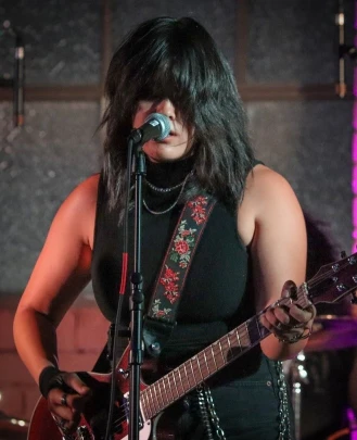 Guitar Teacher, Vocal Teacher, Show Director Macie Vergeire