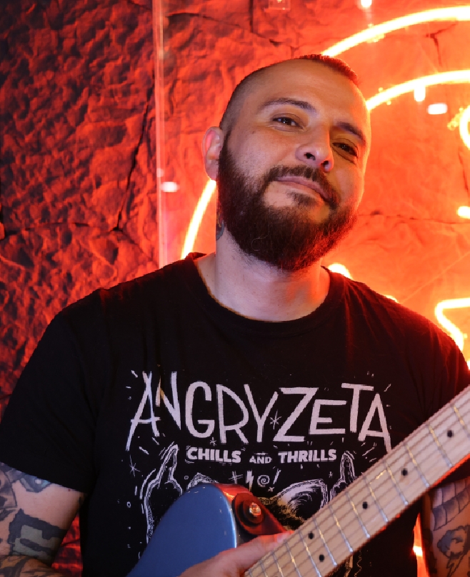 INSTRUCTOR DE GUITARRA MAURICIO VELA