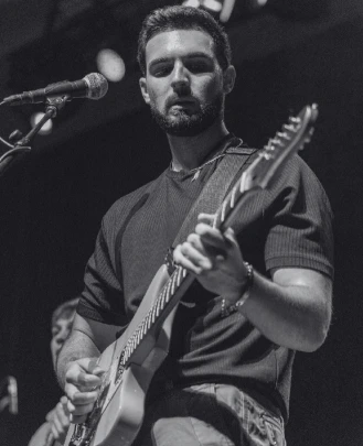 Guitar Teacher, Assistant Show Director Sean