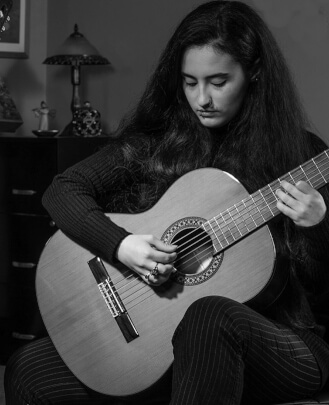 Director, Guitar Teacher Vanessa Torre